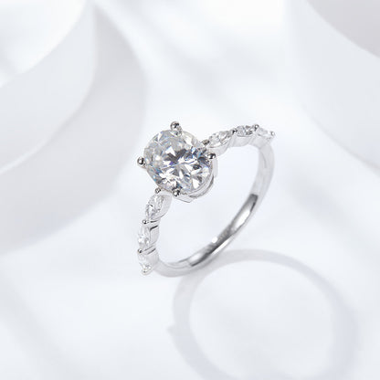 Side Stone Oval 4 Claw Moissanite Engagement Ring